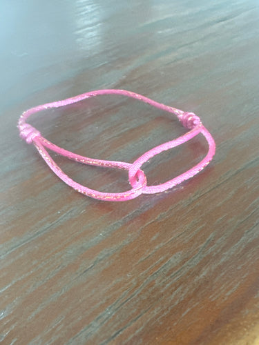 Satijnen armbandje roze met glitter