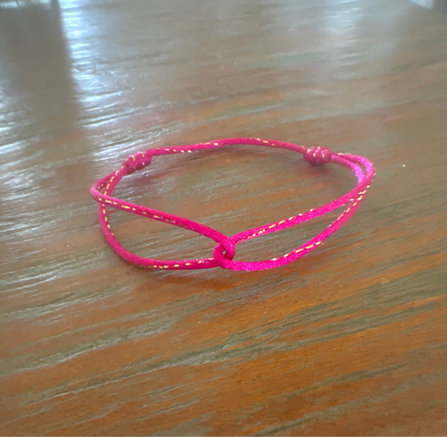 Satijnkoord armbandje fuchsia met glitter